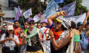 gina speaking at People's March at COP 30