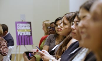 a row of people in a crowd