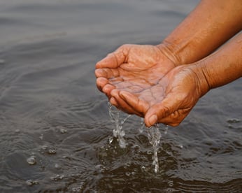 Vecteezy closeup hands water in river
