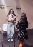 Claudia being filmed at COP30